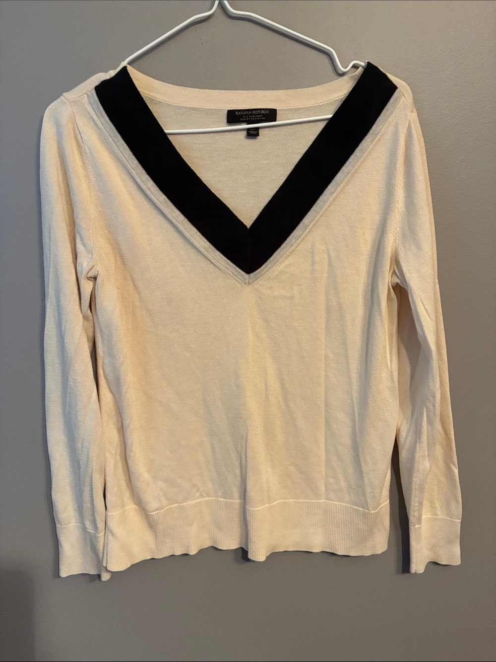 Banana Republic Cream V‑Neck Sweater with Black V‑Trim